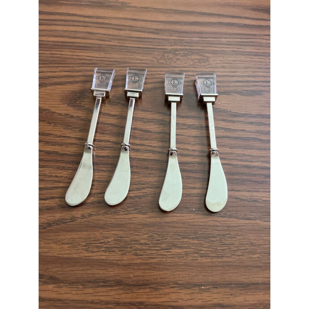 Set of four mini spreaders with initial L